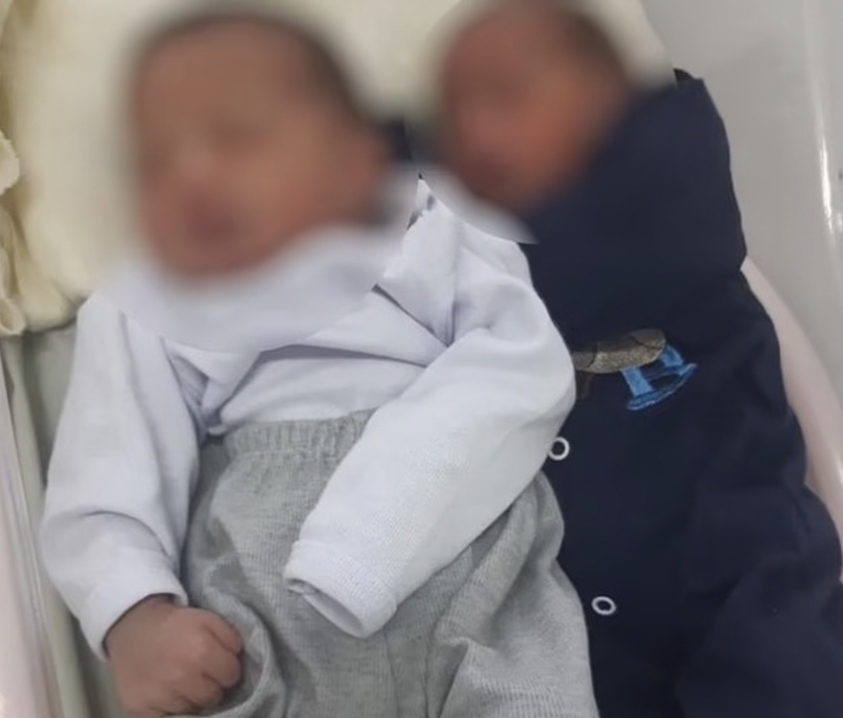 兩個孩子由不同父親所生。